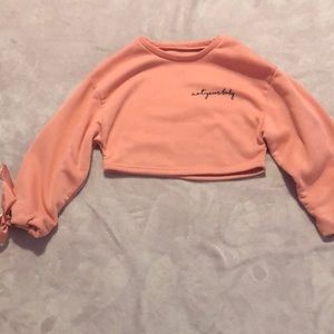 not your baby pink crop top sweatshirt